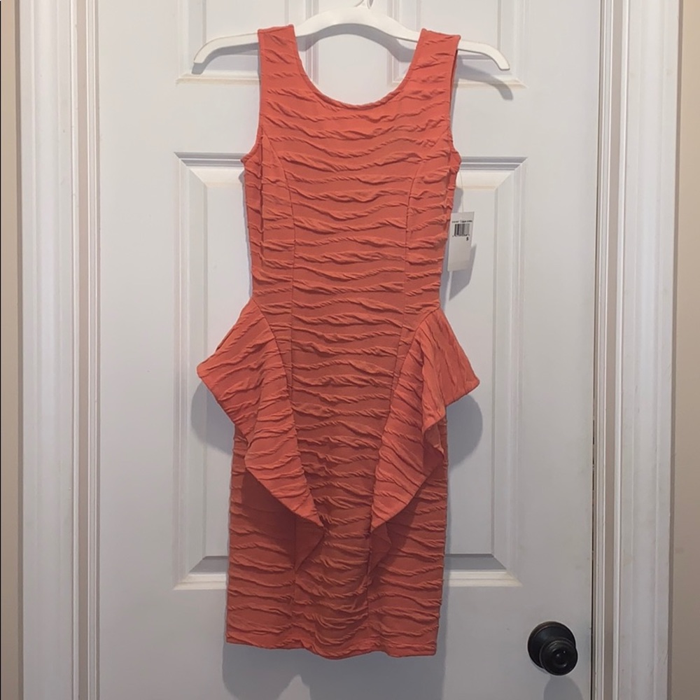 Sugar & Spice Peplum Dress